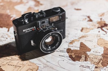 black Konica SLR camera on map
