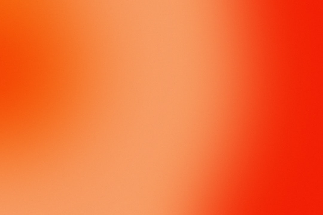 a close up of a red and orange background