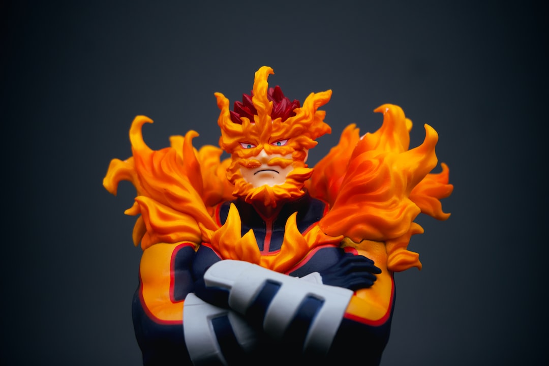 a close up of a figurine of a person with fire on his face