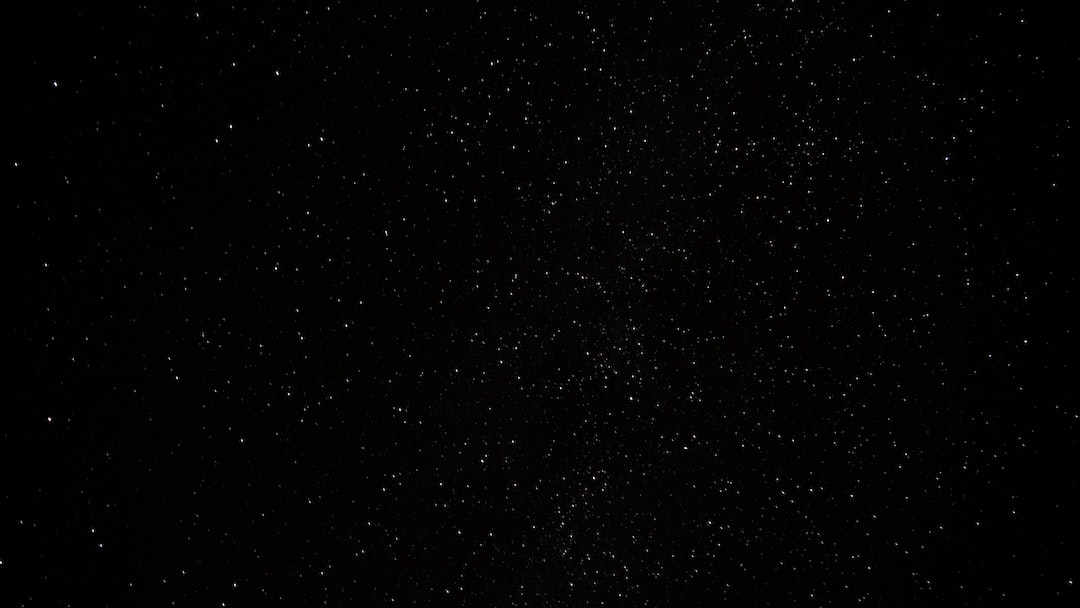 a black sky with a lot of stars