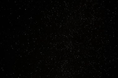 a black sky with a lot of stars