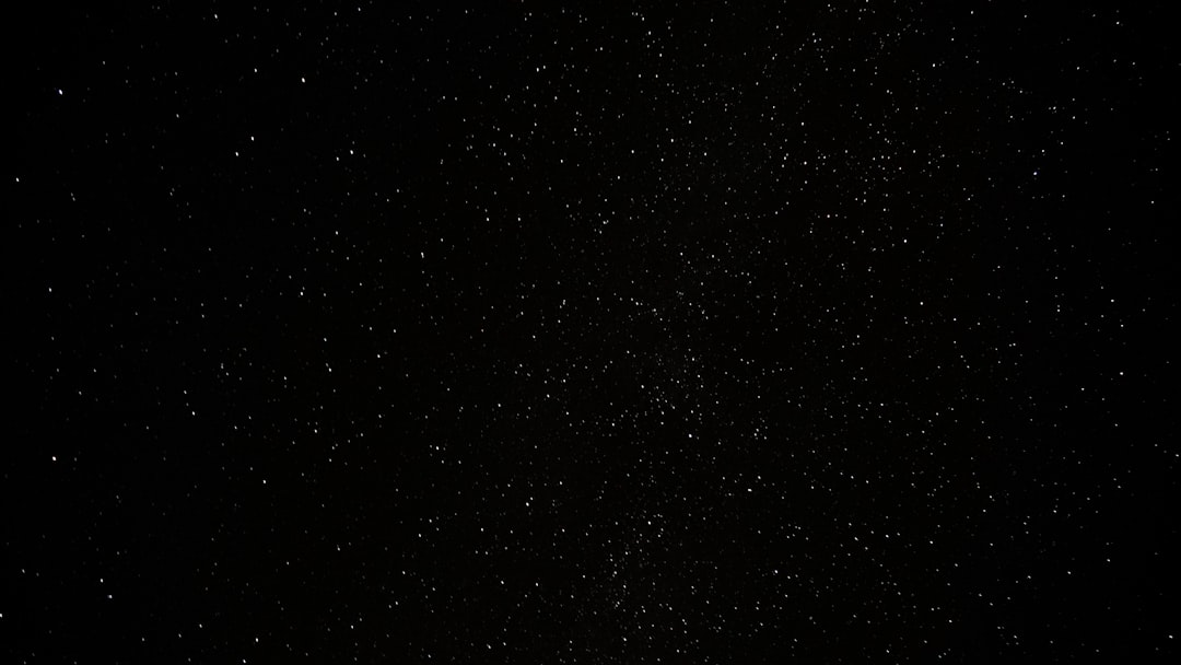 a black sky with a lot of stars