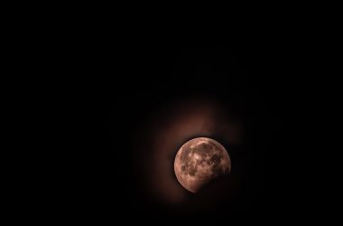 moon surrounded by black background
