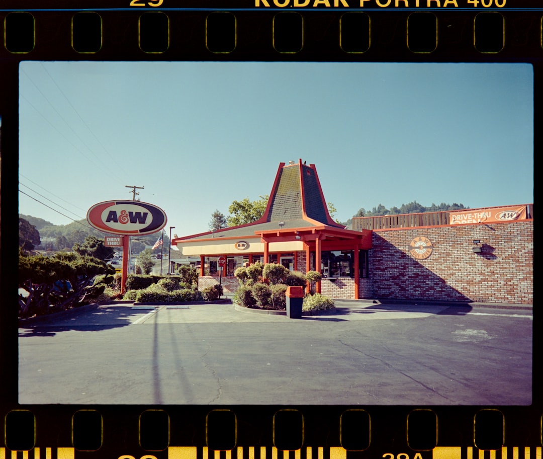 a picture of a building with a sign in front of it