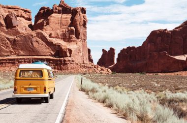 yellow Volkswagen van on road