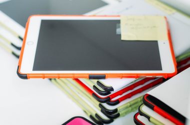 white ipad on white table