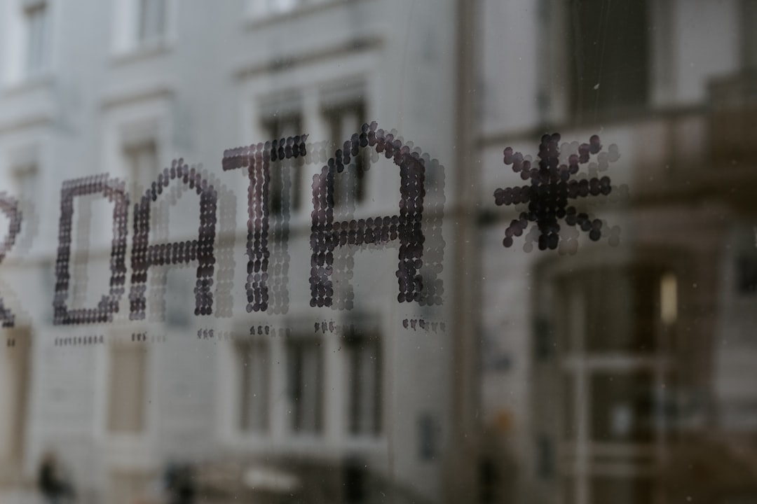 a close up of a window with a building in the background