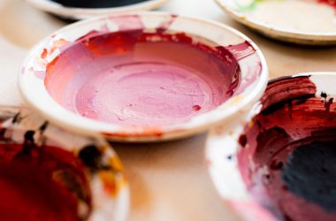 white and red ceramic bowl