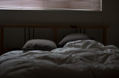 empty white and gray bed set