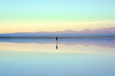 person standing near body of water during daytime