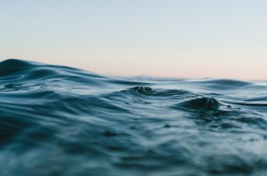 body of water under sky