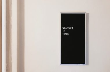 gray metal framed chalkboard with whatever it takes written