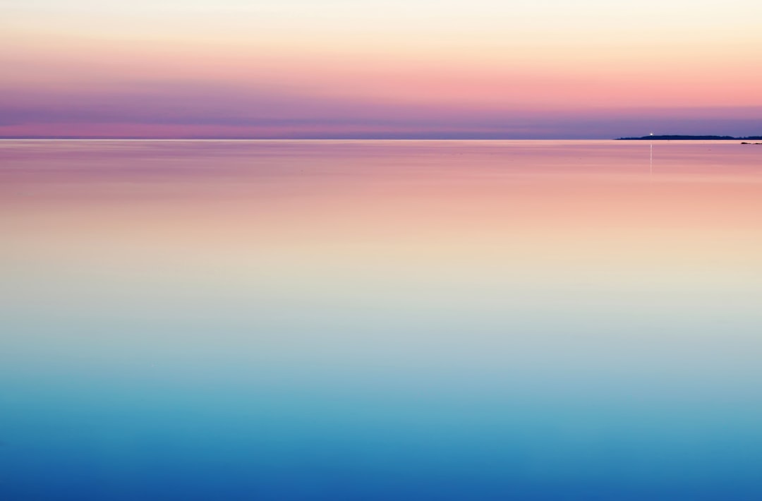 photo of blue and pink sea