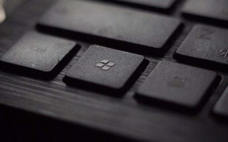 black laptop computer keyboard in closeup photo