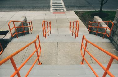 red metal chairs on gray concrete floor