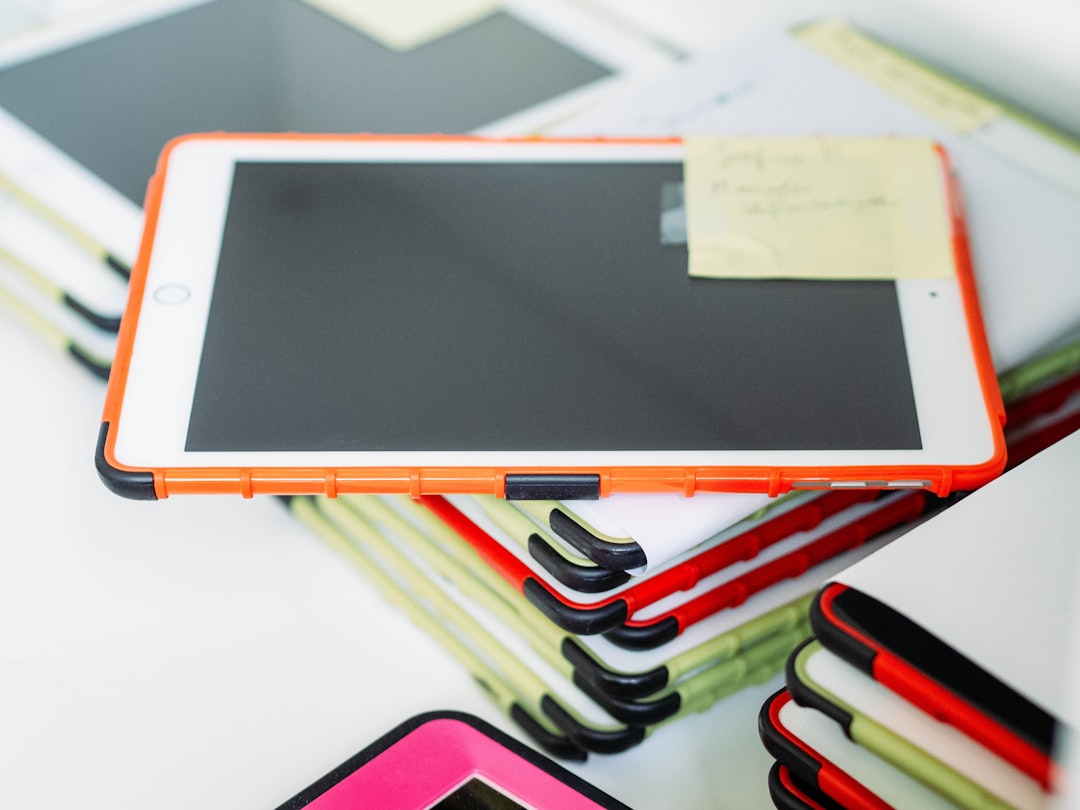 white ipad on white table