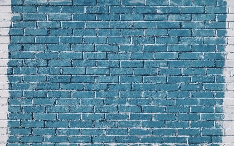gray concrete bricks painted in blue