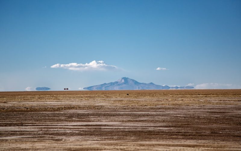 mountain across brown desert