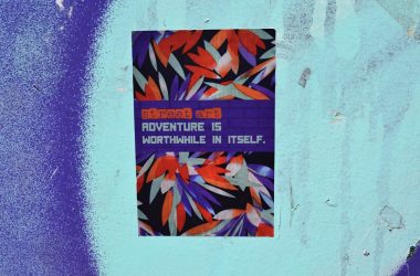 a sign on a wall that says adventure is nowhere in itself