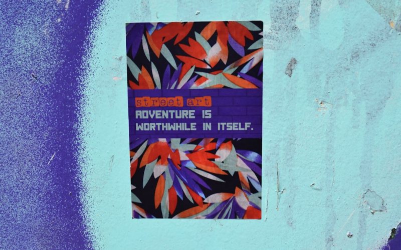 a sign on a wall that says adventure is nowhere in itself