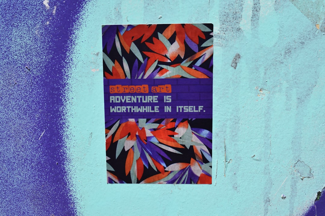a sign on a wall that says adventure is nowhere in itself