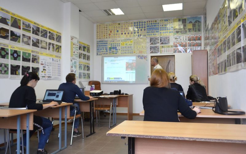 people sitting inside room