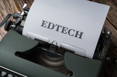 a close up of a typewriter with a piece of paper on it