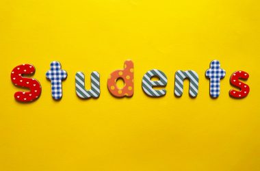 a yellow background with the word students spelled out