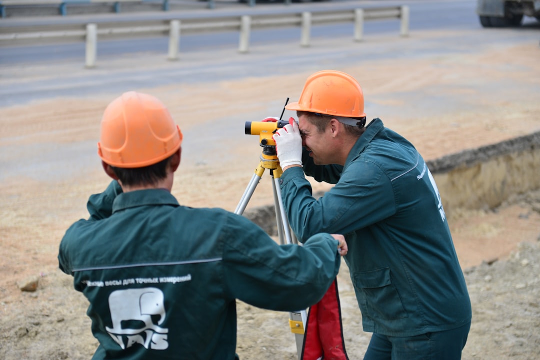 a couple of men standing next to each other