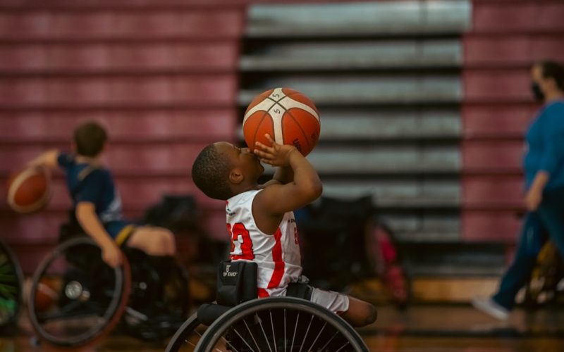 a boy playing basketball