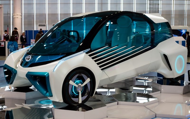 white and blue vehicle inside the building