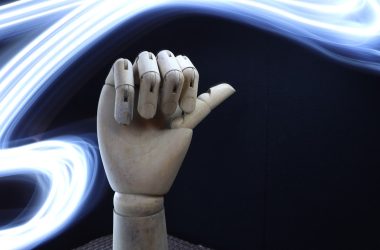 A sculpture of a hand making a gesture