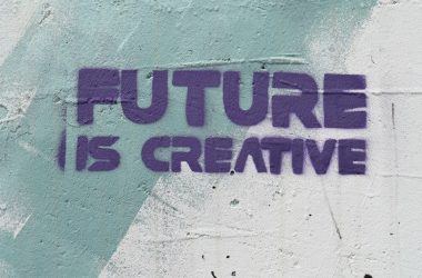a graffiti on a wall that says, future is creative