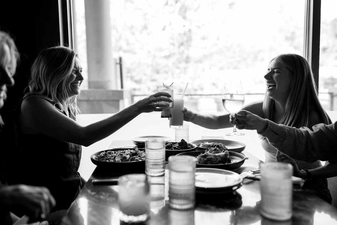 A group of people sitting around a table