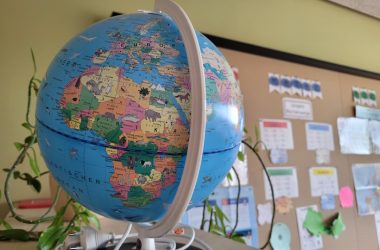 A globe sitting on top of a desk