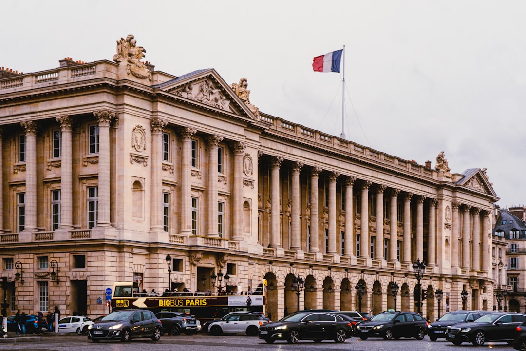 a large building with a flag on top of it