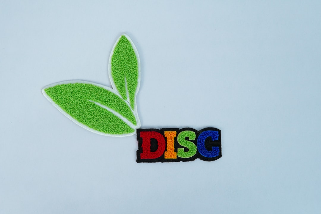 A green leaf with the word disc on it