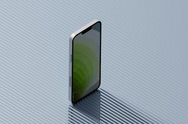 a cell phone sitting on top of a blue surface