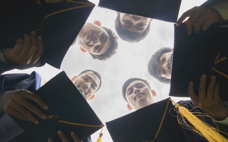 a group of people in graduation robes