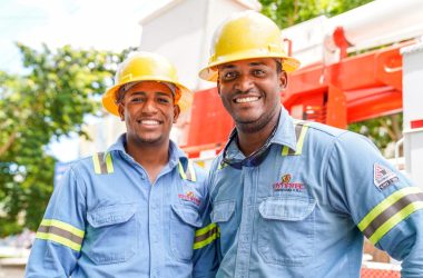 a couple of men standing next to each other