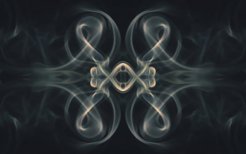 a picture of smoke with a black background