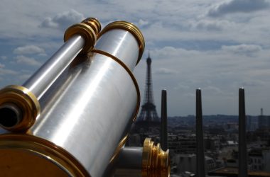 focus photography of telescope on Eiffel Tower, Paris
