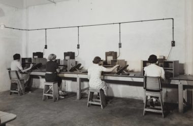 woman sitting in front of desk