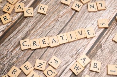 scrabble tiles spelling out the word creative