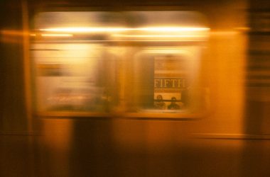 a blurry photo of a train passing by