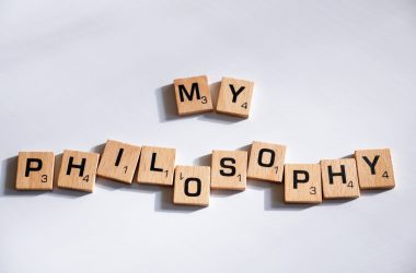 scrabbled scrabble tiles spelling the word my, my, and