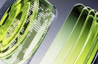 a close up of a green object on a white surface