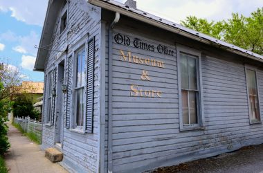 an old building with a sign that says museum and store