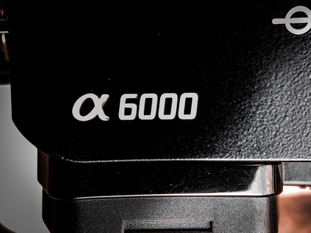 a close up of a camera with a black body