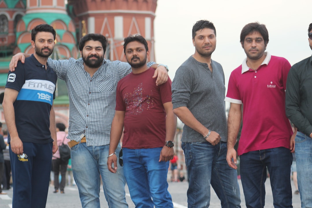 A group of men standing next to each other